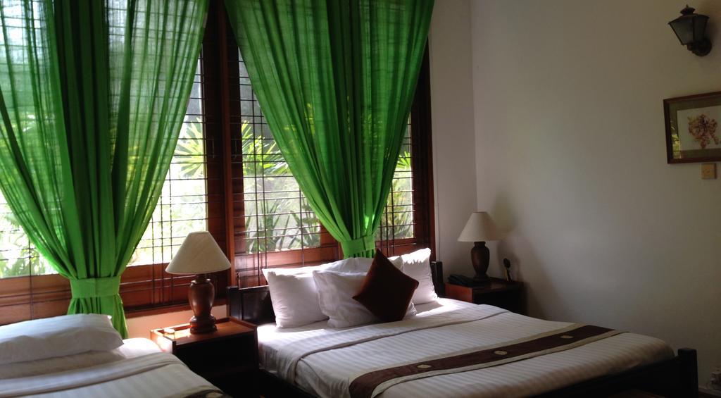 يانغون Classique Inn الغرفة الصورة
